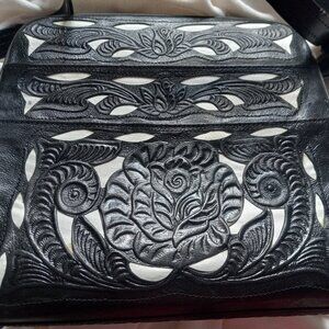 Black leather stencil cut purse